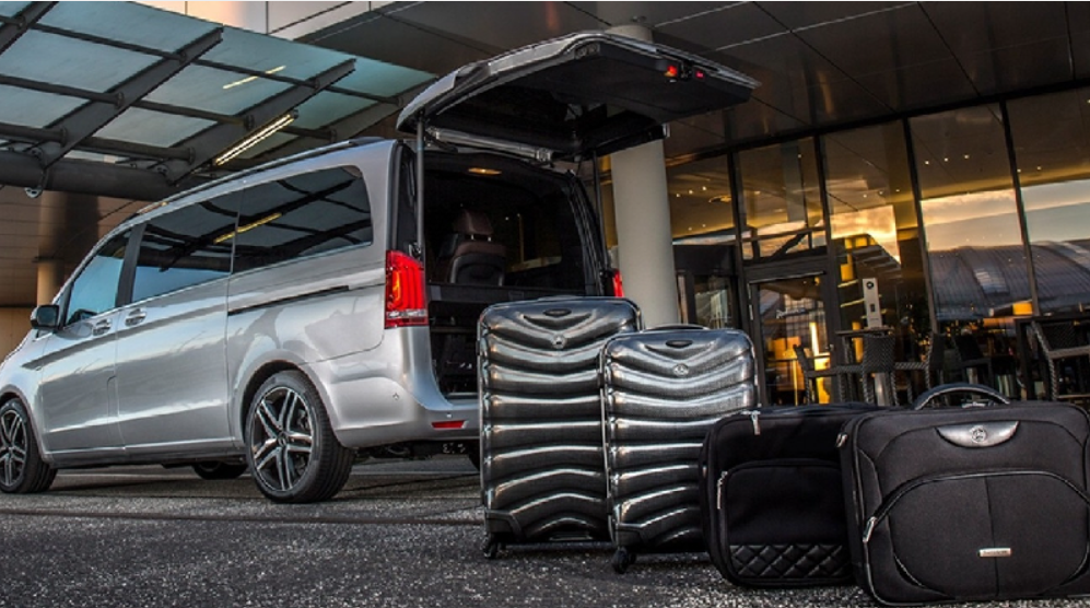 Luggage loading at the airport Mama Jorjakis Villas